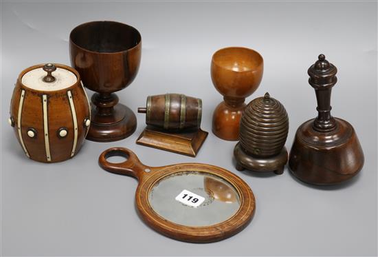 A group of assorted treen including an early Victorian rosewood toilet mirror, a beehive string box and a mallet